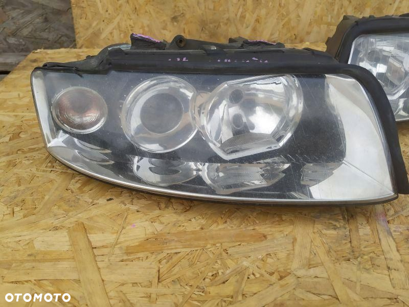 REFLEKTOR LAMPA PRAWA+ LEWA AUDI A4 B6 8E0941004F - 2