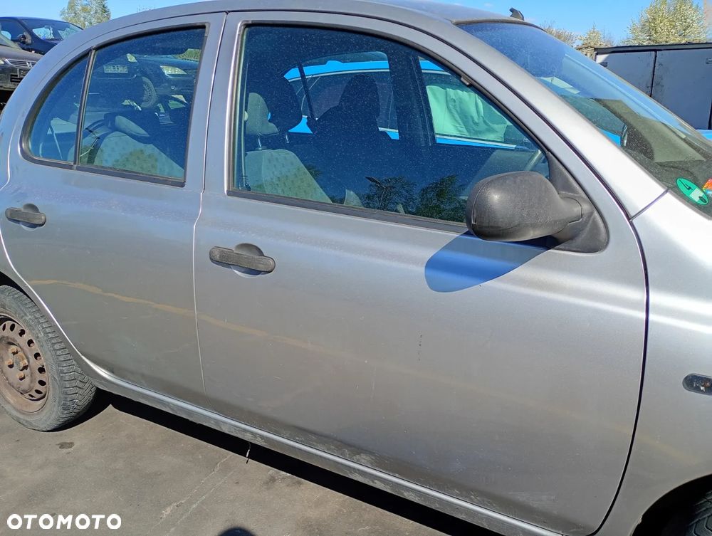 NISSAN MICRA K12 03-07 1.2 16V CG12DE - LAMPKA OŚWIETLENIA TABLICY REJESTRACYJNEJ - 2