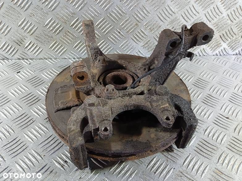 ZWROTNICA LEWA PRZEDNIA OPEL ASTRA H - 1