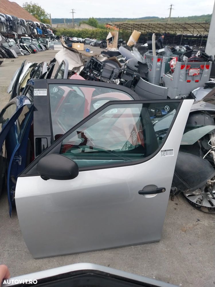 VAND USA PARTEA STANGA FATA PENTRU SKODA ROOMSTER 2010 - 1