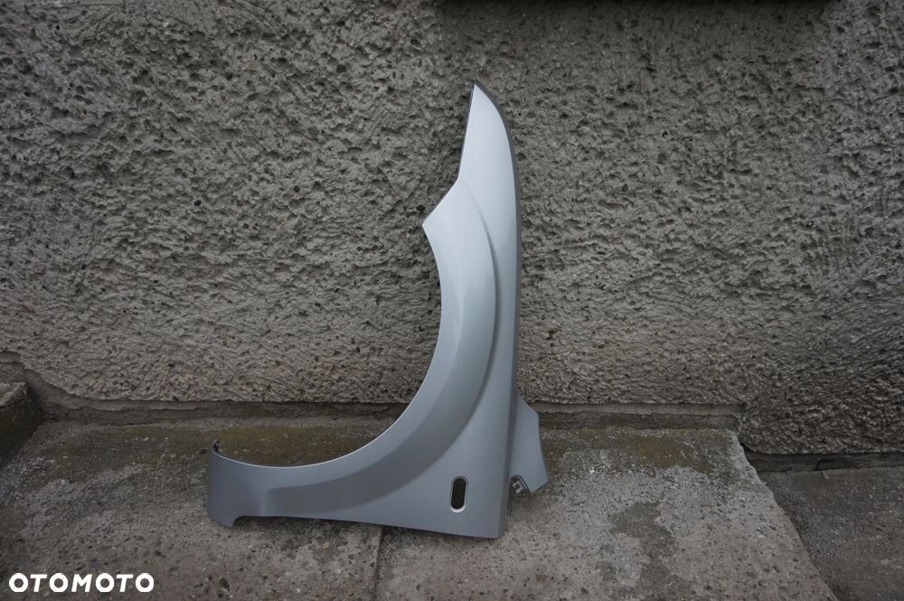 BŁOTNIK LEWY FORD FOCUS II MK2 04/08r 03 O3 - 2