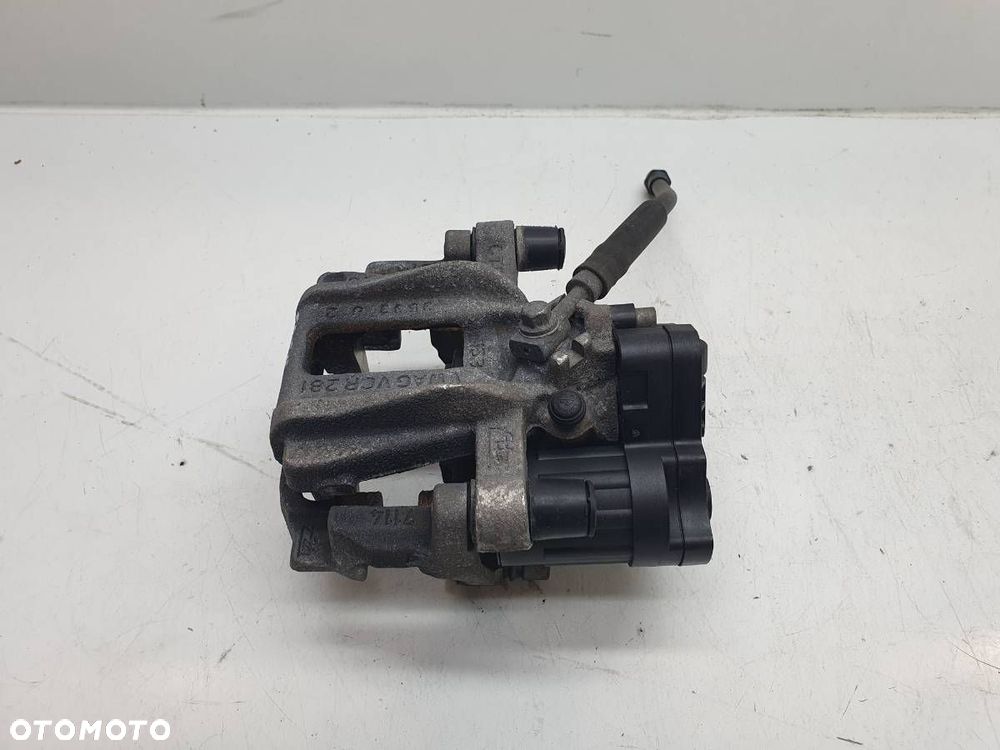 ZACISK HAMULCOWY TYŁ TYLNY LEWY JARZMO SKODA OCTAVIA IV LIFT 2.0 TDI - 1