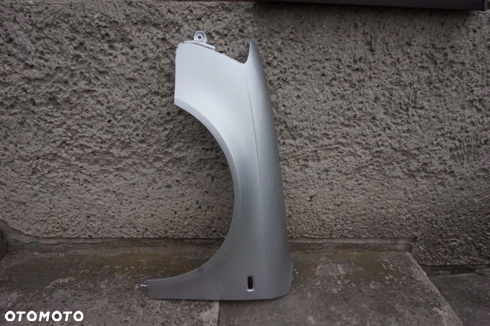 BŁOTNIK PRZEDNI LEWY AUDI A4 B7 LY7W 04/07r - 2