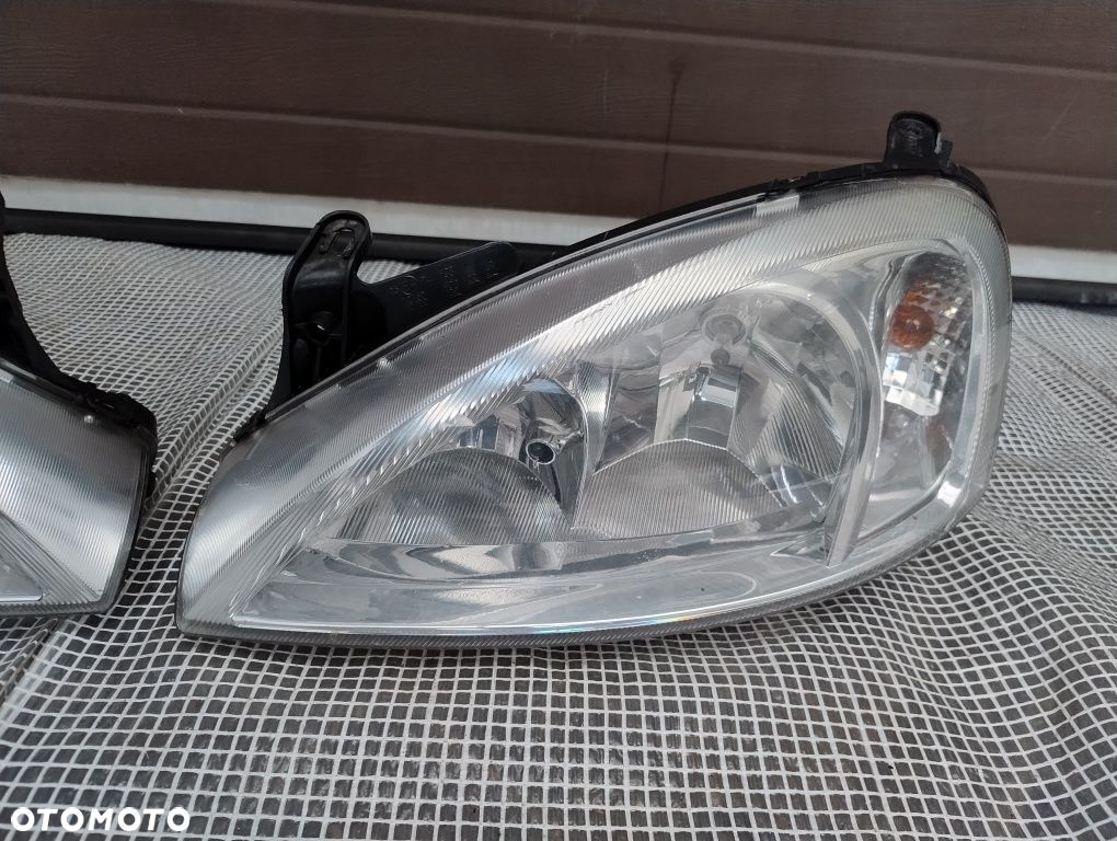 Opel Corsa c lift Europa lampa reflektor prawy lewy komplet DJ auto - 3