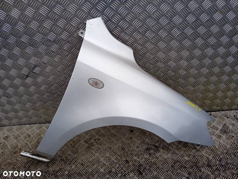 BŁOTNIK PRAWY MAZDA 2 - 1