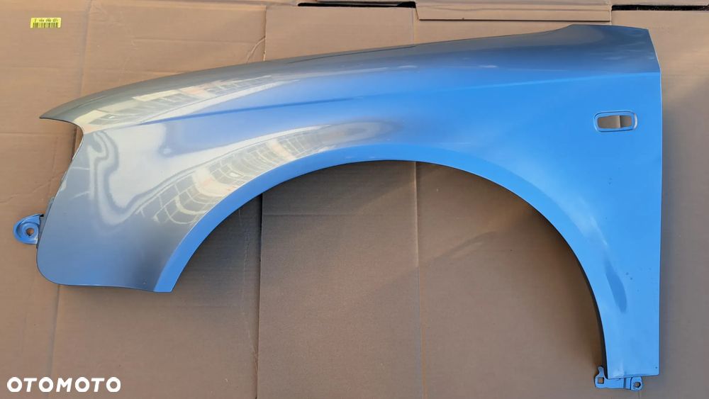 Błotnik AUDI A4 B7 LY5J (Liquidblau jasny niebieski metalik) lewy przód do modeli sedan kombi od 2004 do 2007 - 1