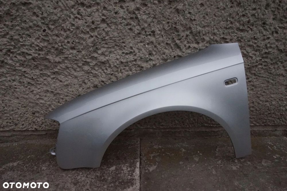 BŁOTNIK PRZEDNI LEWY AUDI A4 B7 LY7W 04/07r - 1