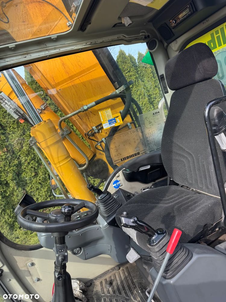 Liebherr 314 Litronic Rotator - 12