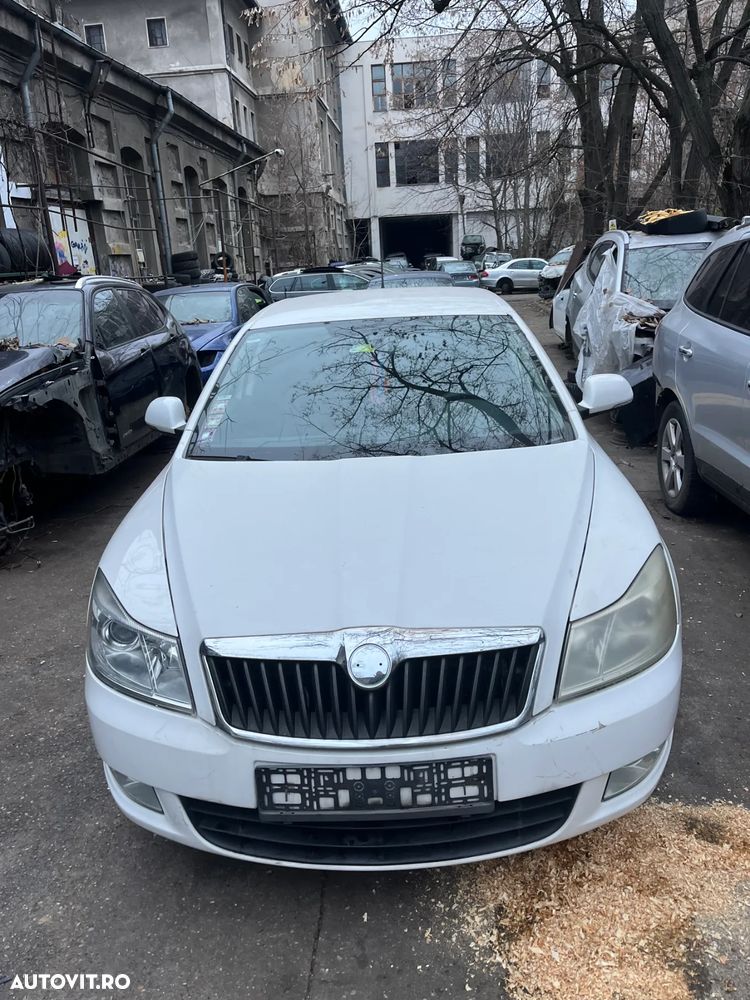 Far stanga cu lupa si halogen Skoda Octavia 2 facelift 2012 - 6