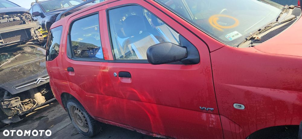 SUZUKI IGNIS II 03-10 1.3 M13A OSŁONA PRZECIWSŁONECZNA PRAWA LEWA - 11