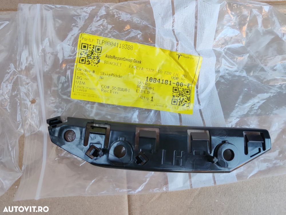 Suport plastic montare prindere bara fata pe aripa stanga dreapta NOI TESLA Model 3 1084182-00-E / 1084181 - 6