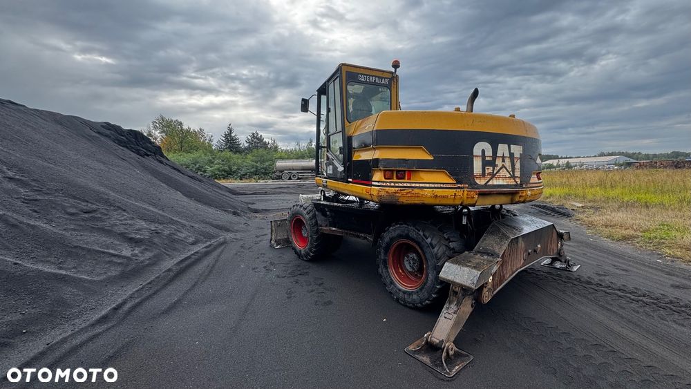 Caterpillar M312 - 4