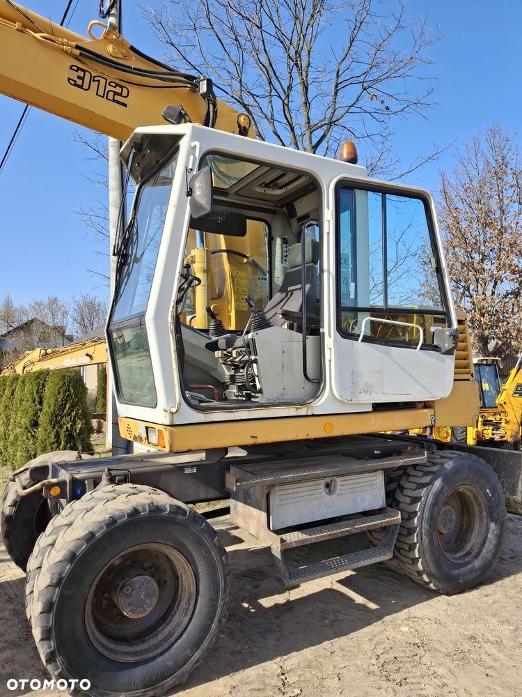 Liebherr A312 CAT JCB - 3