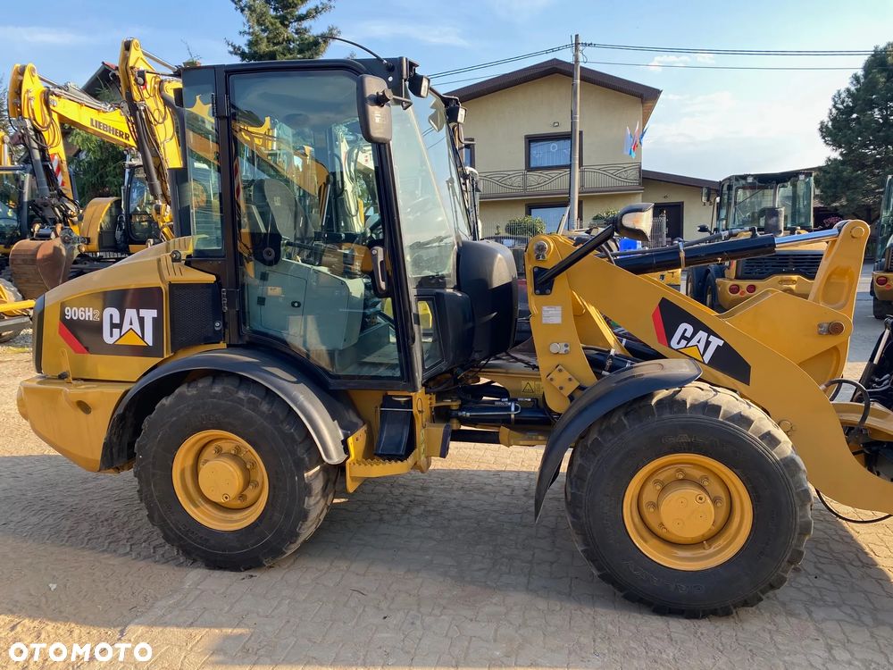 Caterpillar CAT 906H2, 2013 ROK, ŁYŻKA OTWIERANA + WIDŁY, z NIEMIEC, SUPER STAN, - 14