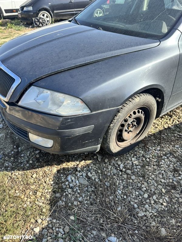 dezmembrari dezmembrez piese Skoda octavian 2 2012 benzina tour oct culoare 9j/ F8J capot kit airbaguri modelu Facelift cutie manuala volan pe Stanga - 4