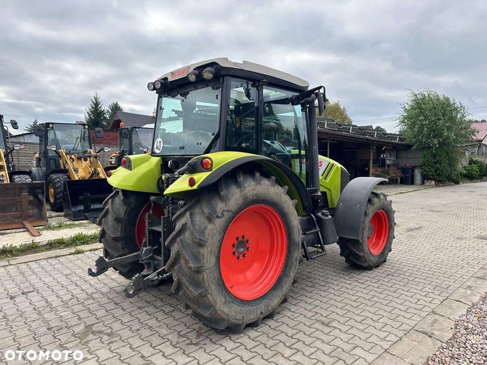 Claas Axos 320 - 4
