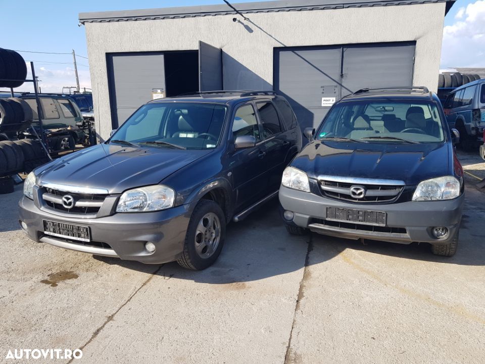 Dezmembrez mazda tribute 2.0 si 2.3 benzina manual - 1