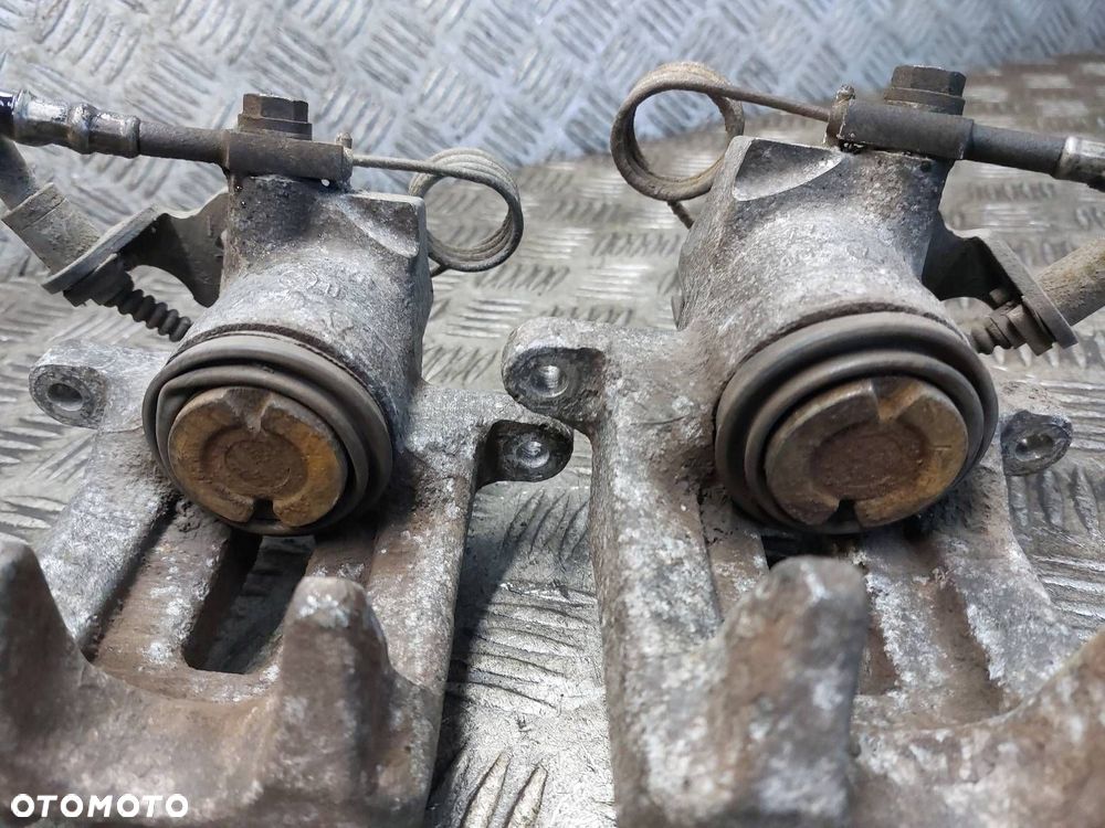 TARCZE HAMULCOWE TYŁ + ZACISKI VOLKSWAGEN PASSAT B5 - 3