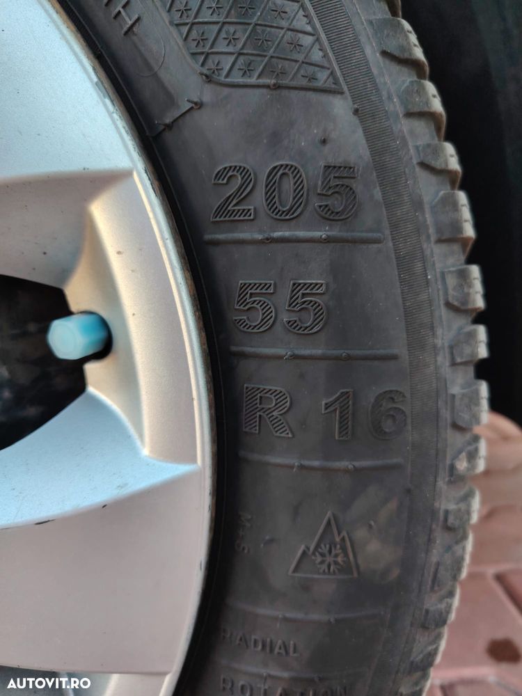 Opel Astra 1.4i Elegance - 12