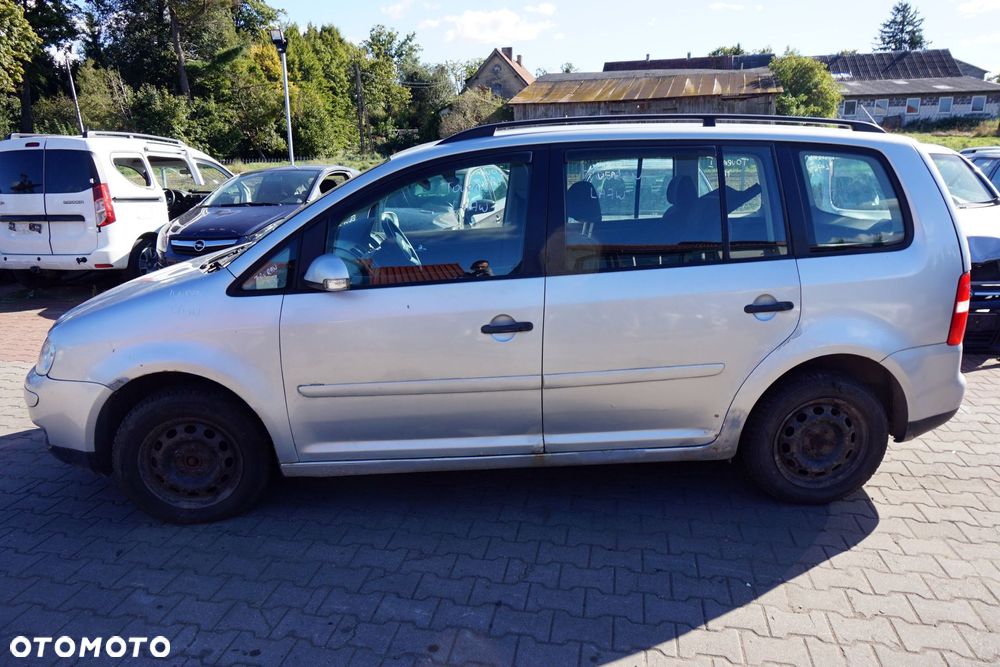 VOLKSWAGEN TOURAN I 1T 2006 LA7W 1.9 TDI BXE 105KM GQN SREBRNY na części - 2