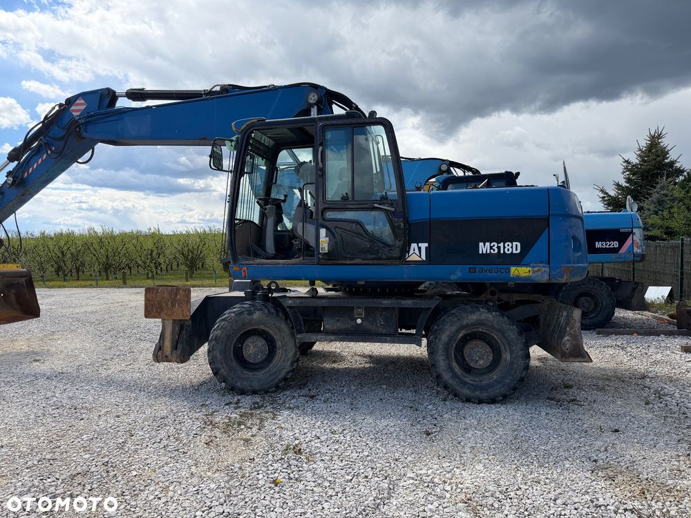 Caterpillar M318D - 1