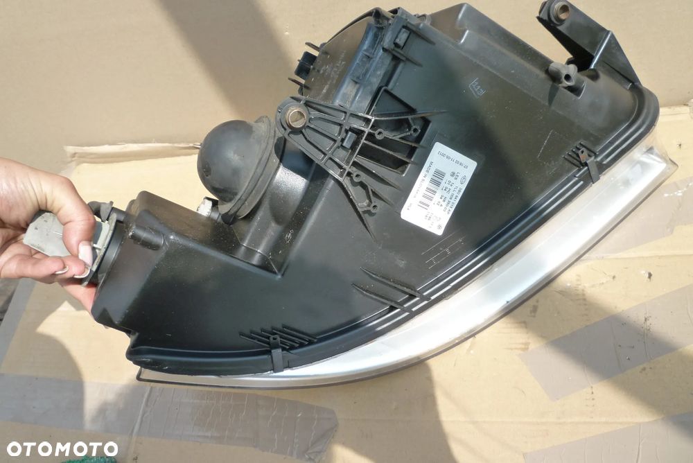 Lampa lewa VW Passat B5 lift Hella Europa - 4