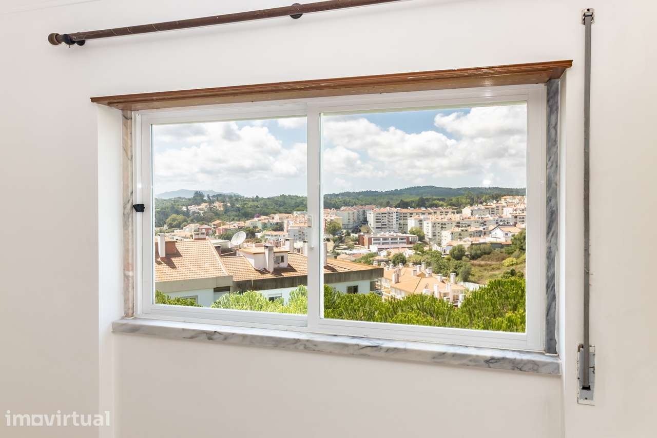 T2 em Belas | Um apartamento onde a vista muda tudo - Grande imagem: 2/40