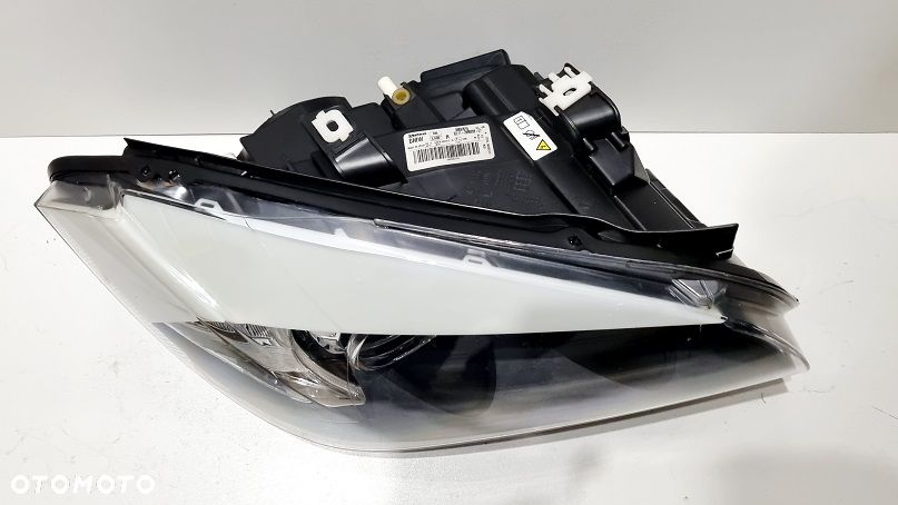 REFLEKTOR PRAWY XENON BMW X1 E84 EUROPA - 3