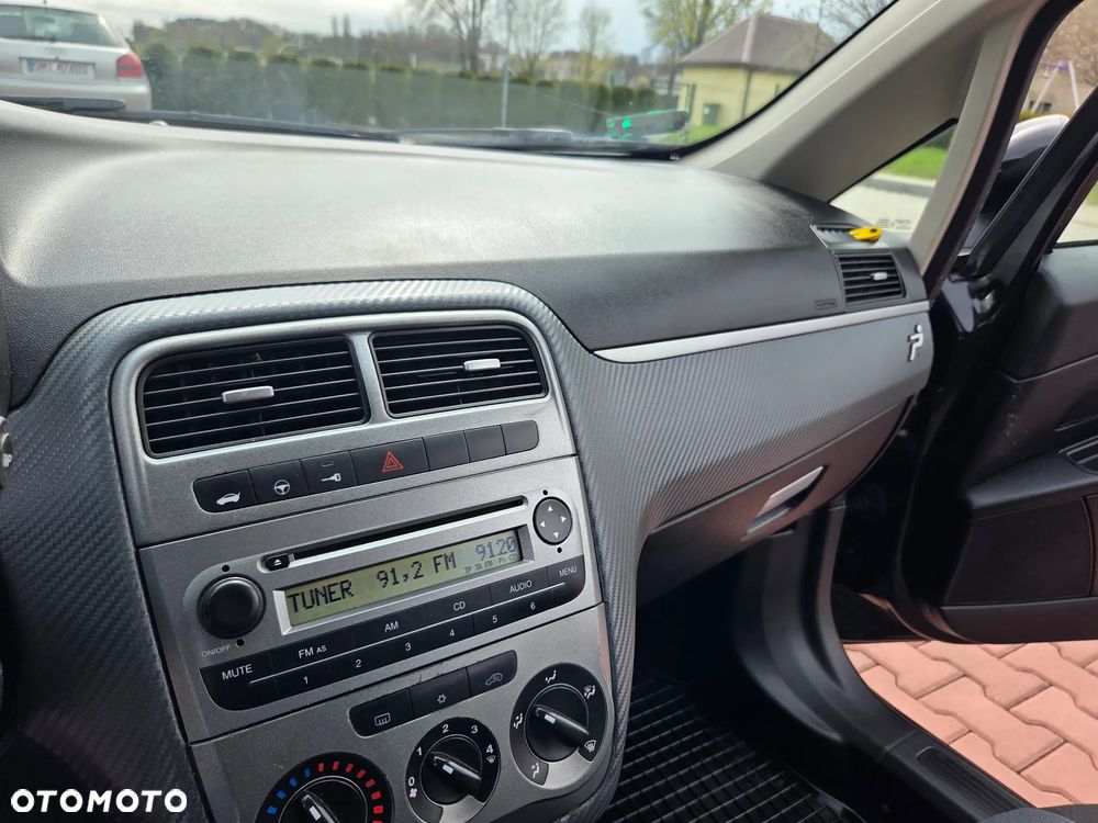 Fiat Grande Punto 1.4 8V Emotion - 34