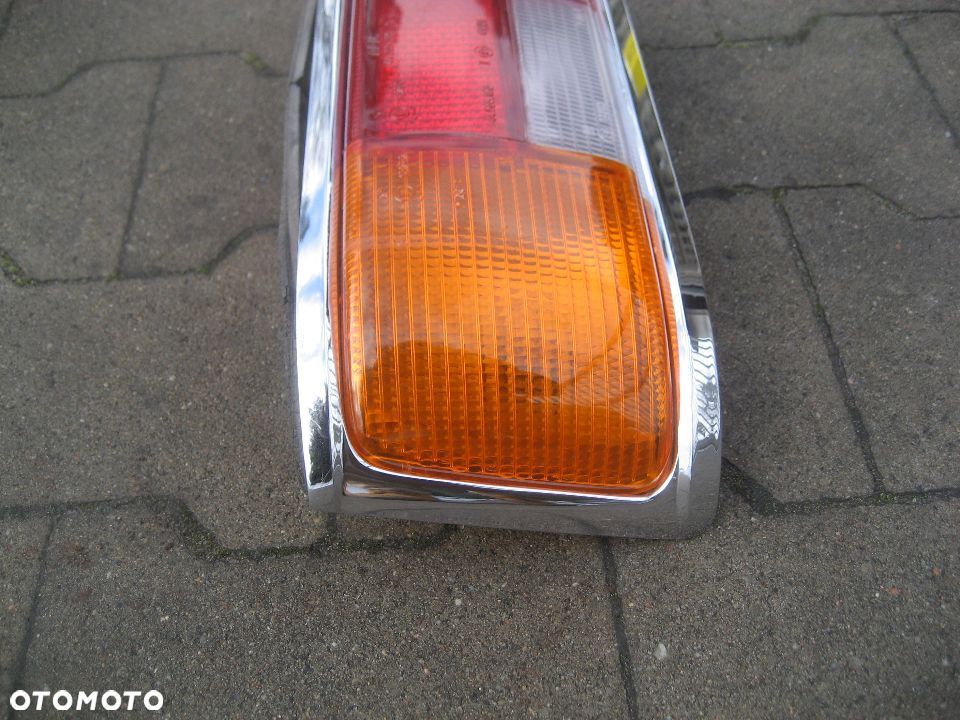mercedes 115 w115 w 115 lampa tył lewa chrom 1158260551 - 2