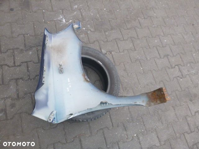 BŁOTNIK LEWY PRZÓD LEWY PRZEDNI TOYOTA YARIS I LIFT 03-05 - 20