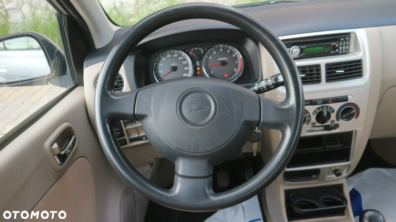 Daihatsu Cuore 1.0 Top - 27