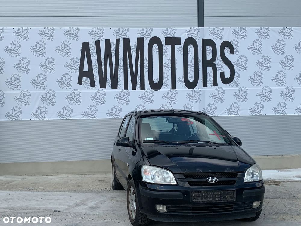 HYUNDAI GETZ 2003 1.3 *SAMOCHÓD NA CZĘŚCI* 1129 MASKA, LAMPA, DRZWI, LUSTERKO, ZDERZAK, GRILL, BŁOTNIK, KLAPA, BELKA, DESKA, FOTELE, KANAPA, ĆWIARTKA KIEROWNICA, TARCZE, ZACISKI, ZAWIESZENIE, KOMPLETNY PRZÓD, KOMPLETNY TYŁ, LICZNIK, ZEGARY, PRAWE LEWE PRZÓD TYŁ - 2