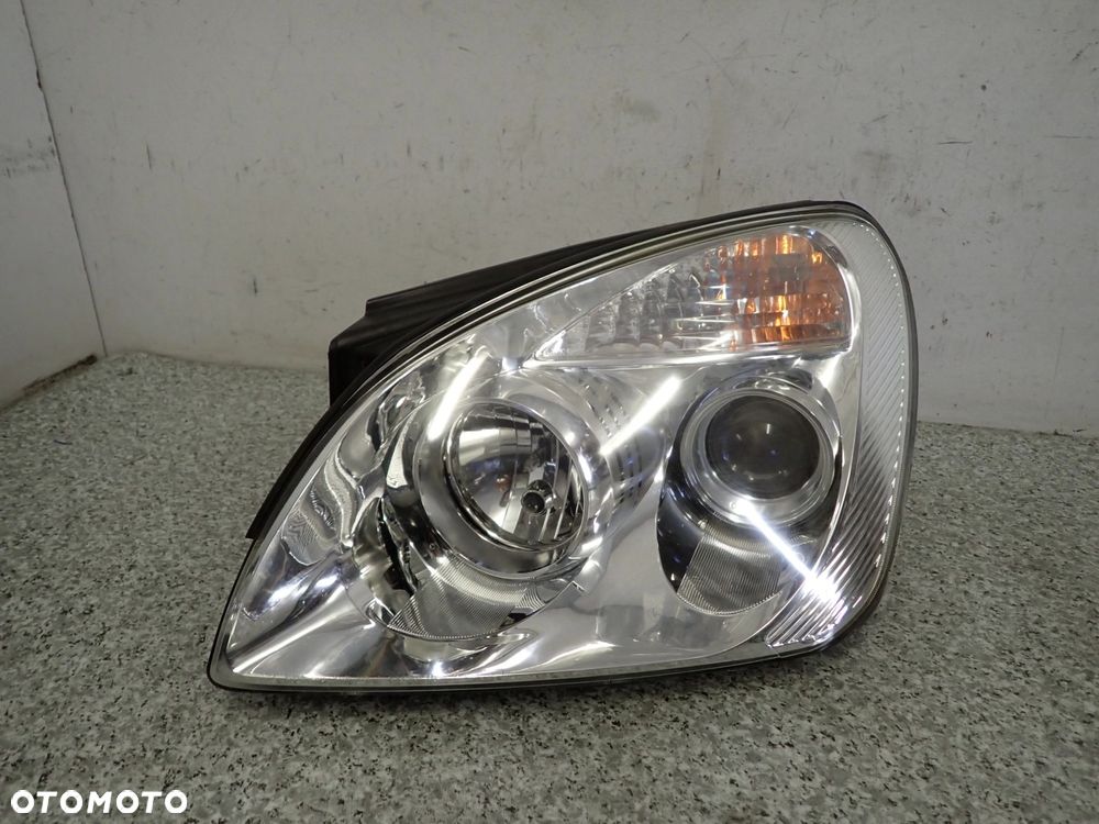 KIA CARENS III 06-12 LAMPA PRZEDNIA LEWA REFLEKTOR EUROPA - 1
