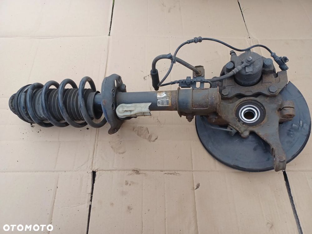 ZWROTNICA MCPERSON LEWA MERIVA B 1.4 T - 1