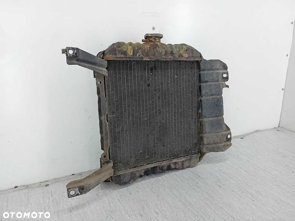 CHŁODNICA WODY Z WENTYLATOREM NISSAN SUNNY B11 1.3 - 6