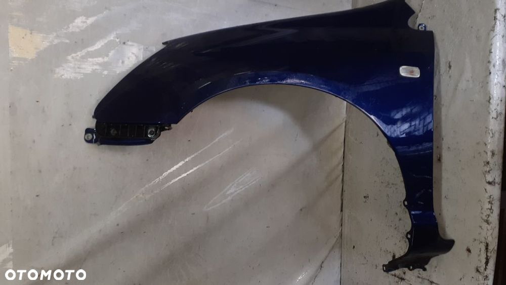 *HONDA CIVIC 7 VII BŁOTNIK PRZÓD LEWY GRANATOWY B96P - 1