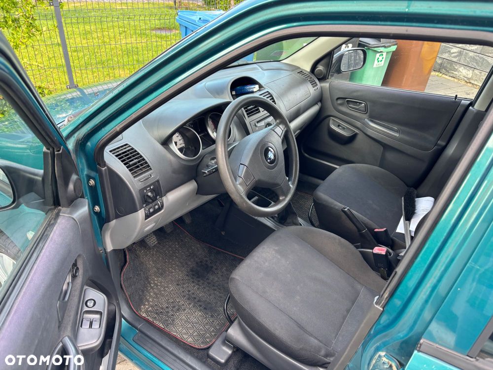 Subaru Justy - 5