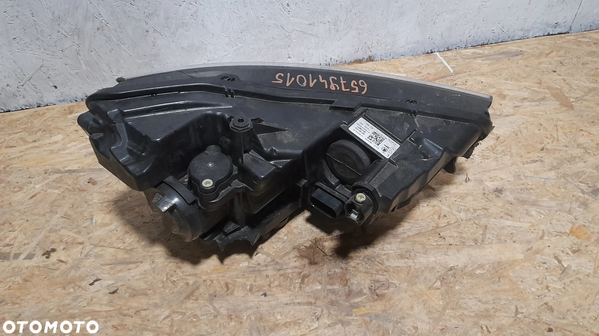 lampa reflektor lewy lewa scala 657941015 uszkodzona - 2