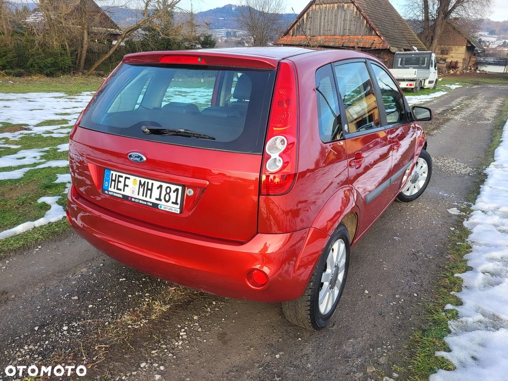 Ford Fiesta 1.6 Ghia - 13