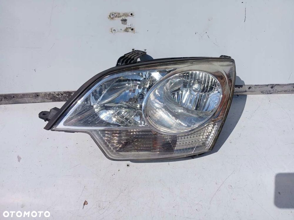 REFLEKTOR LEWY LAMPA PRZEDNIA PRZÓD LEWA OPEL ANTARA - 1