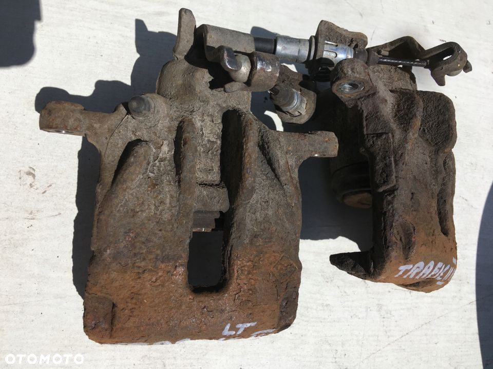 ZACISK HAMULCOWY TYŁ PRAWY LEWY VIVARO TRAFIC II - 1