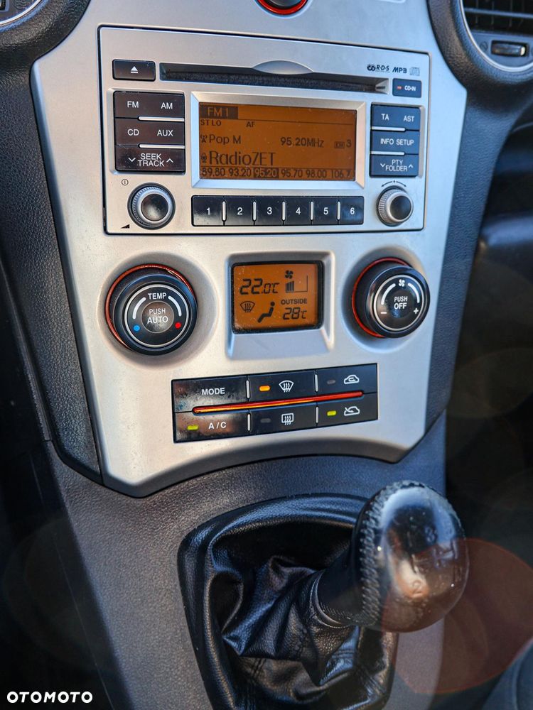 Kia Carens - 16