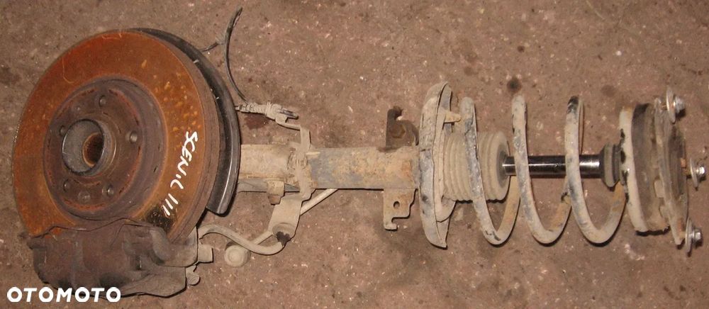 zwrotnica piasta prawa amortyzator zacisk SCENIC III 1.9 DCI