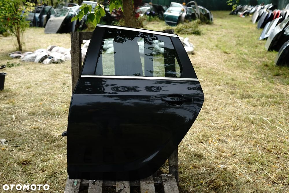 Drzwi tył tylne lewe Opel Astra J IV Kombi Z22C