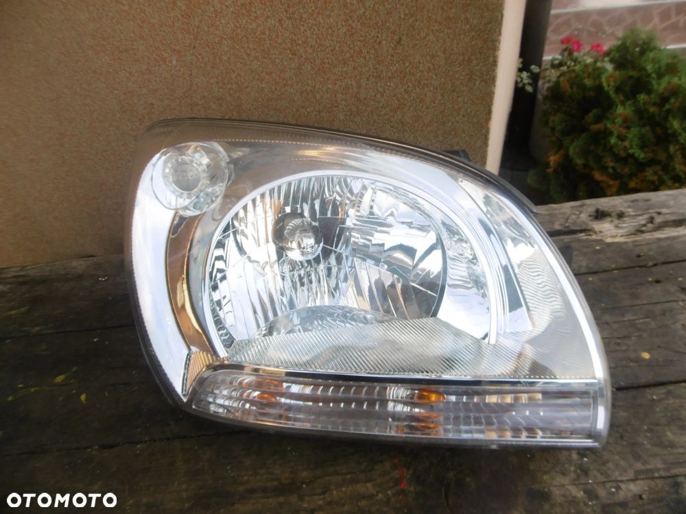 lampa Prawa Kia Sportage II - 1