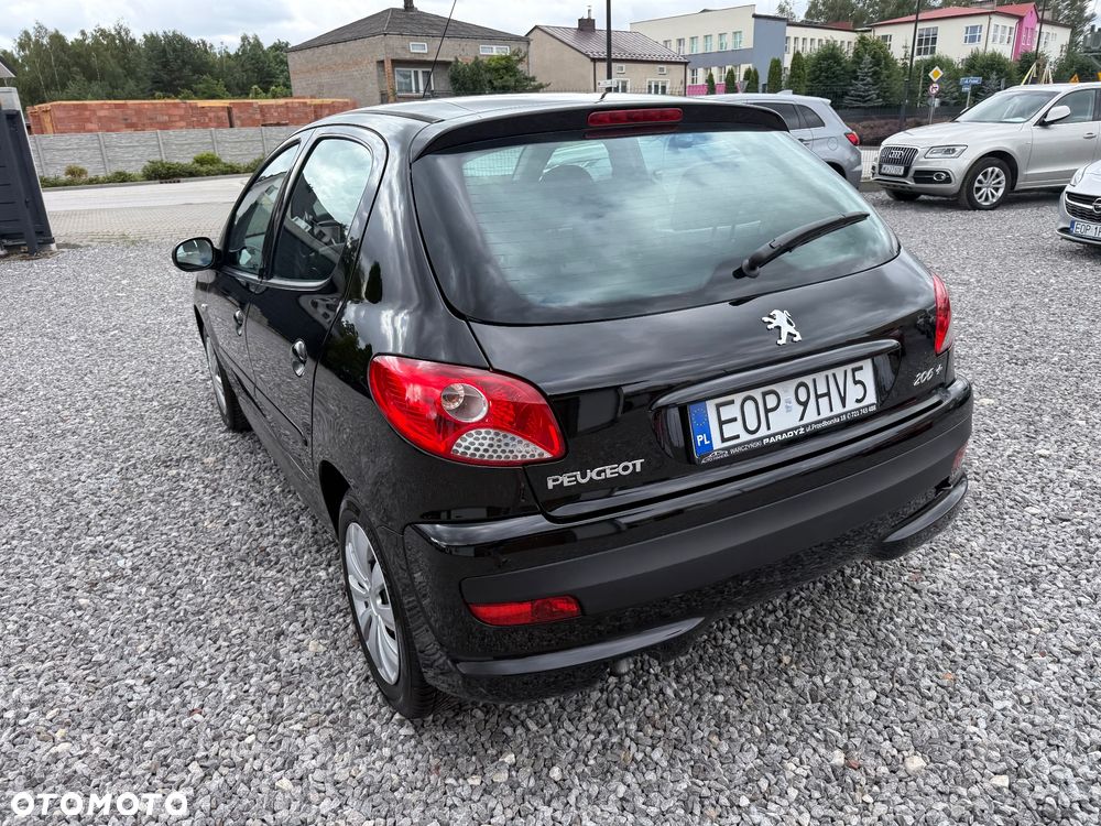 Peugeot 206 plus 75 - 23