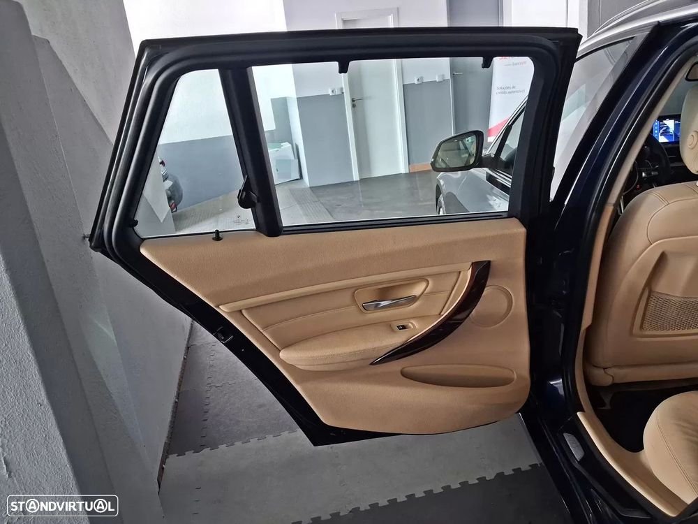 BMW 320 d Auto Exclusive - 13