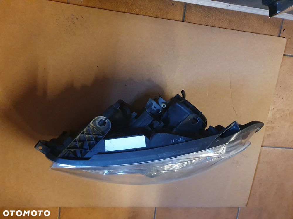 REFLEKTOR LEWY NISSAN QASHQAI J10 LIFT XENON - 5