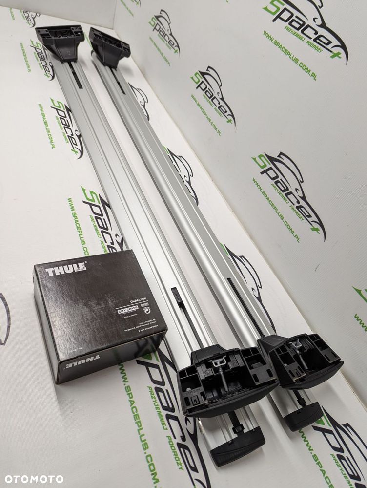Bagażnik dachowy Thule: belki 961 + Stopy 7106 + kit - 7